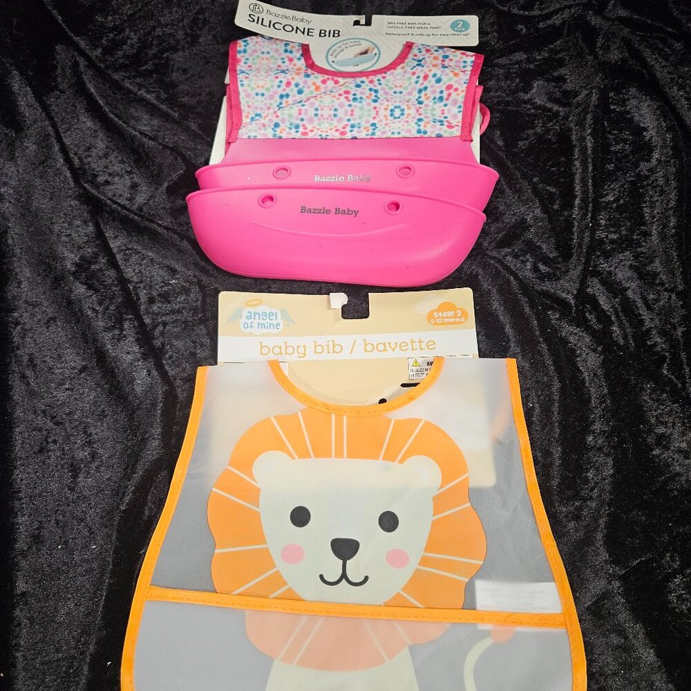 3 Bibs - 2 Pink Silicone, 1 Lion